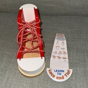 Melissa and Doug learn how to tie shoes!